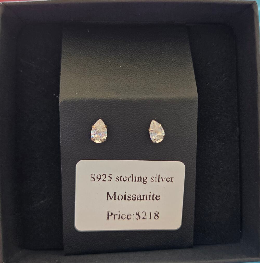 Brand new Moissanite Pear-shaped stud earrings set in Silver